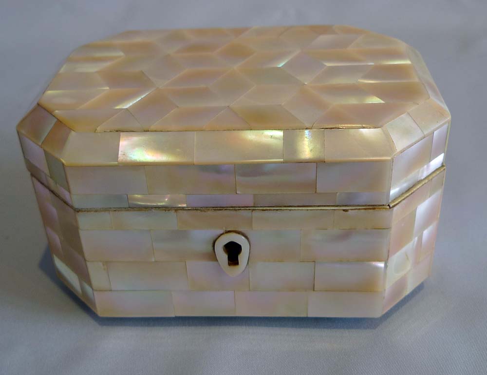 Antique mother of pearl and ivorine casket.