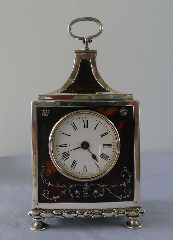 Antique tortoiseshell and silver pique mantel clock by the celebrated William Comyns.