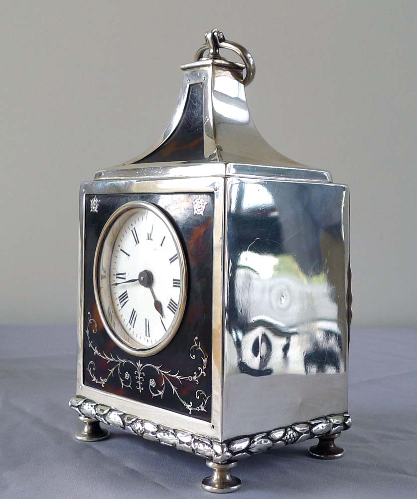 Antique tortoiseshell and silver pique mantel clock by the celebrated William Comyns.