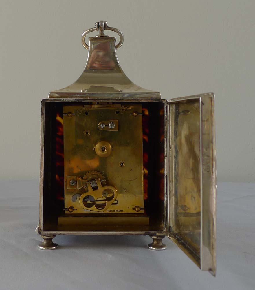 Antique tortoiseshell and silver pique mantel clock by the celebrated William Comyns.