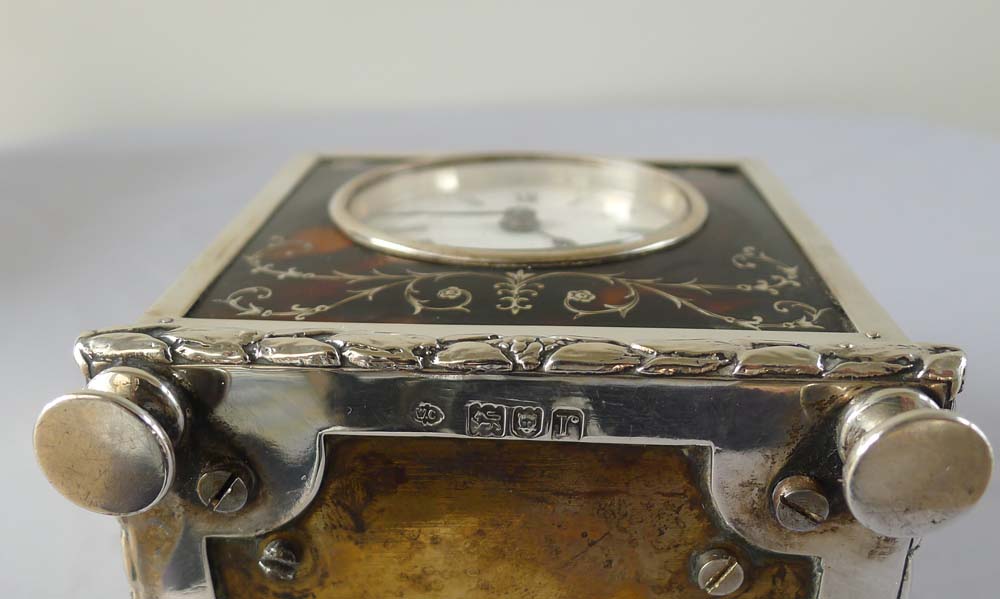 Antique tortoiseshell and silver pique mantel clock by the celebrated William Comyns.