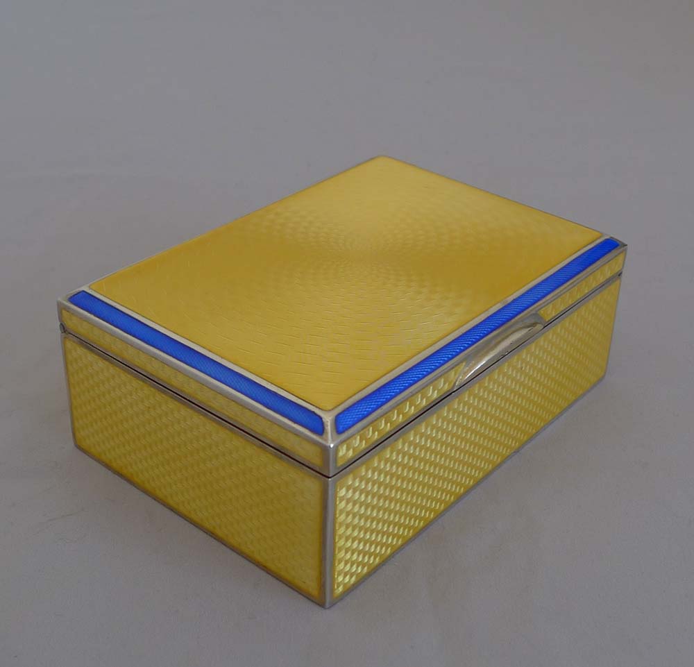 Silver and imperial yellow and blue guilloche enamel Art Deco box.