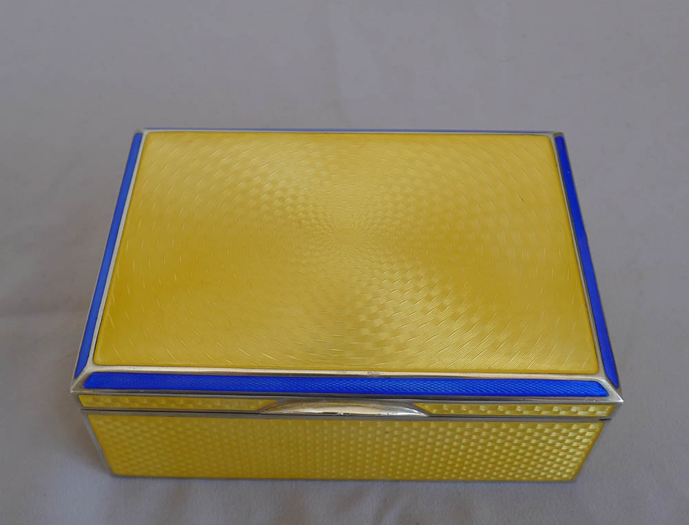 Silver and imperial yellow and blue guilloche enamel Art Deco box.