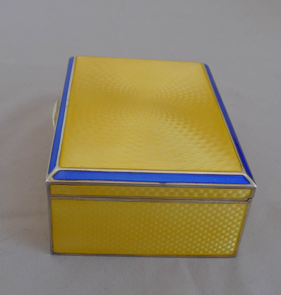 Silver and imperial yellow and blue guilloche enamel Art Deco box.