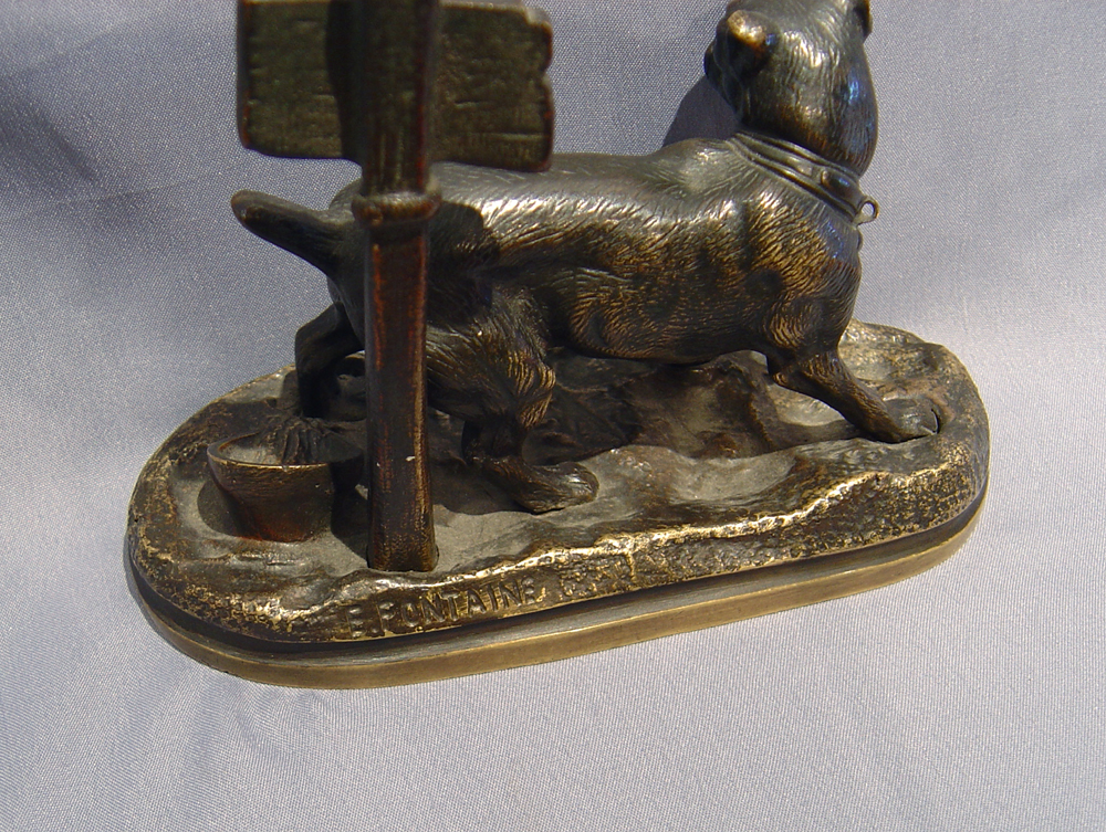 Antique French patinated bronze of a dog.