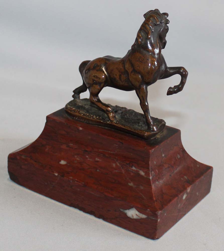Fine bronze of horse on rouge marble base by Rouillard.