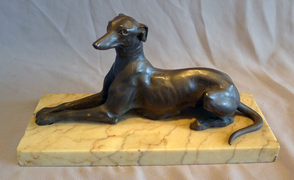 Antique Italian bronze greyhound on marble base.