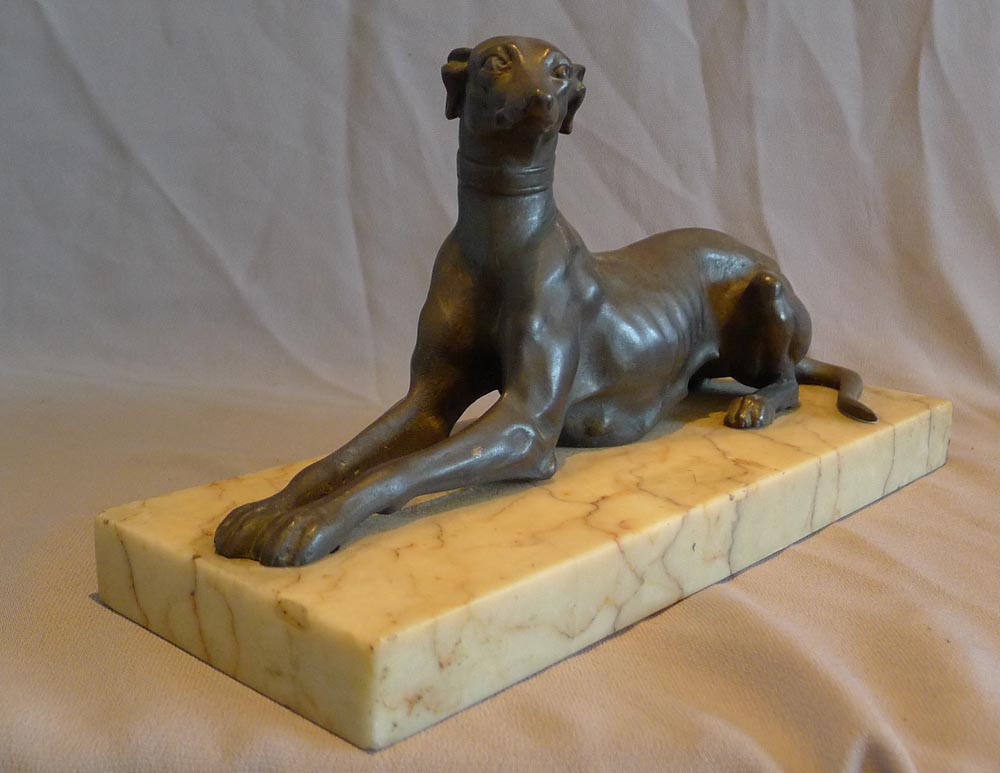 Antique Italian bronze greyhound on marble base.