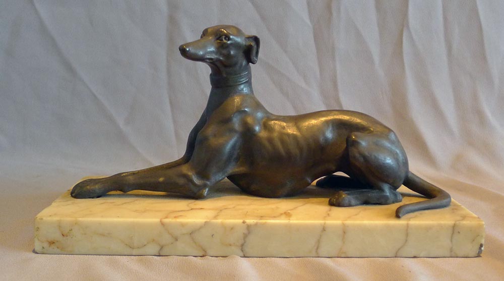 Antique Italian bronze greyhound on marble base.