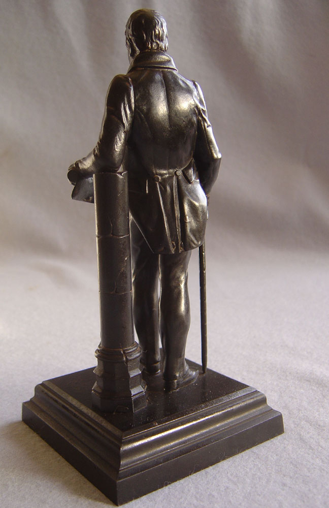 Antique English cast iron model of Sir Walter Scott.