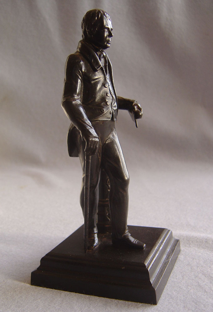 Antique English cast iron model of Sir Walter Scott.
