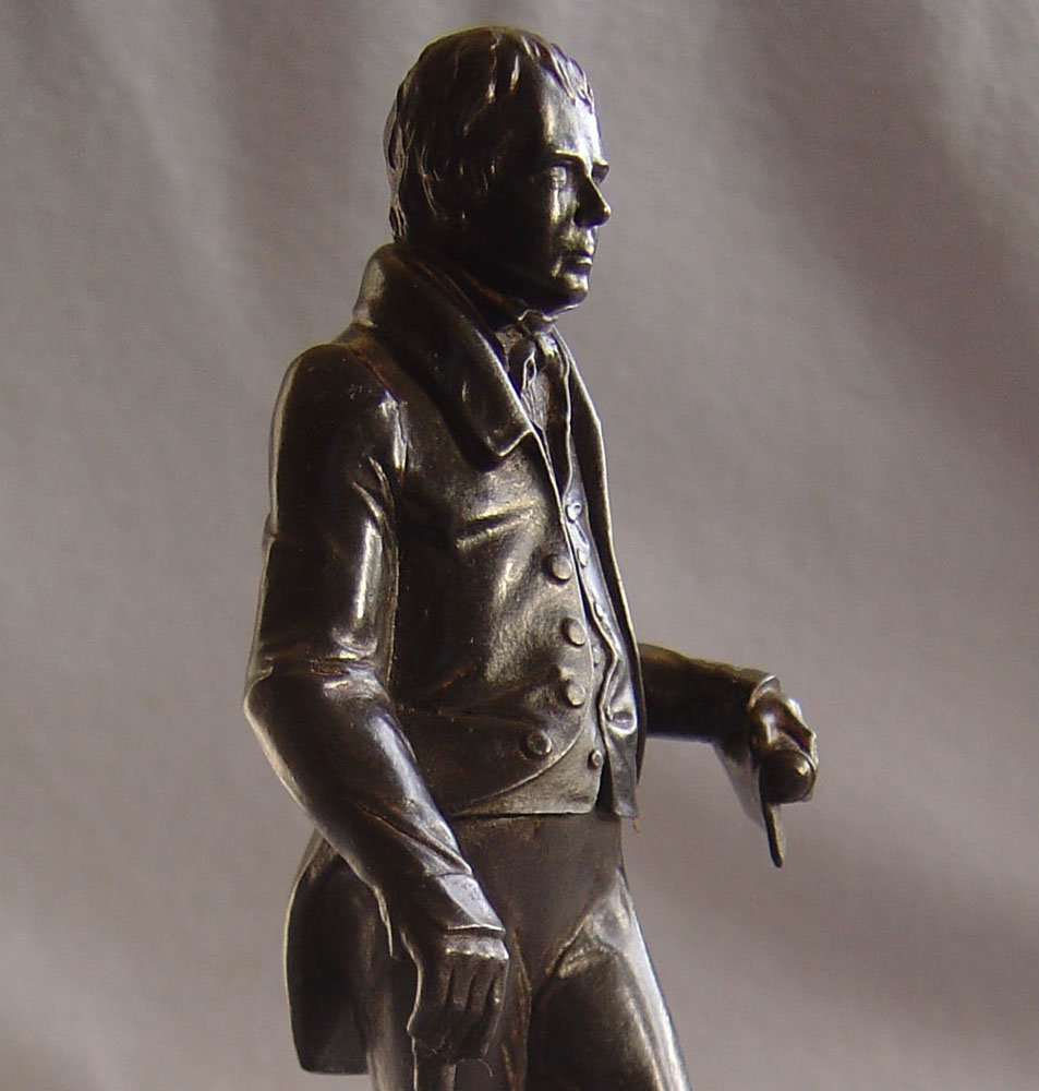Antique English cast iron model of Sir Walter Scott.