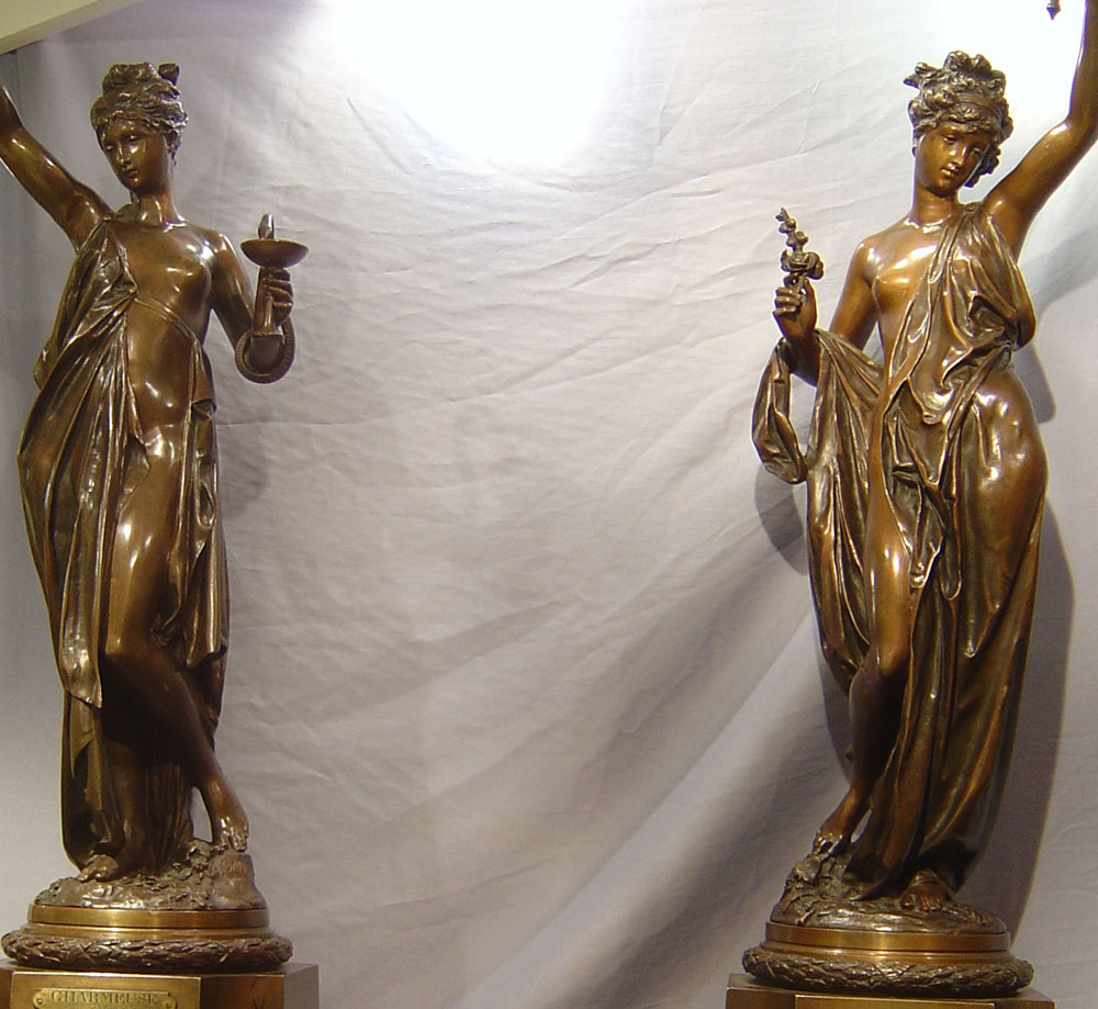 Pair of bronzes by Carrier Belleurse on marble bases.