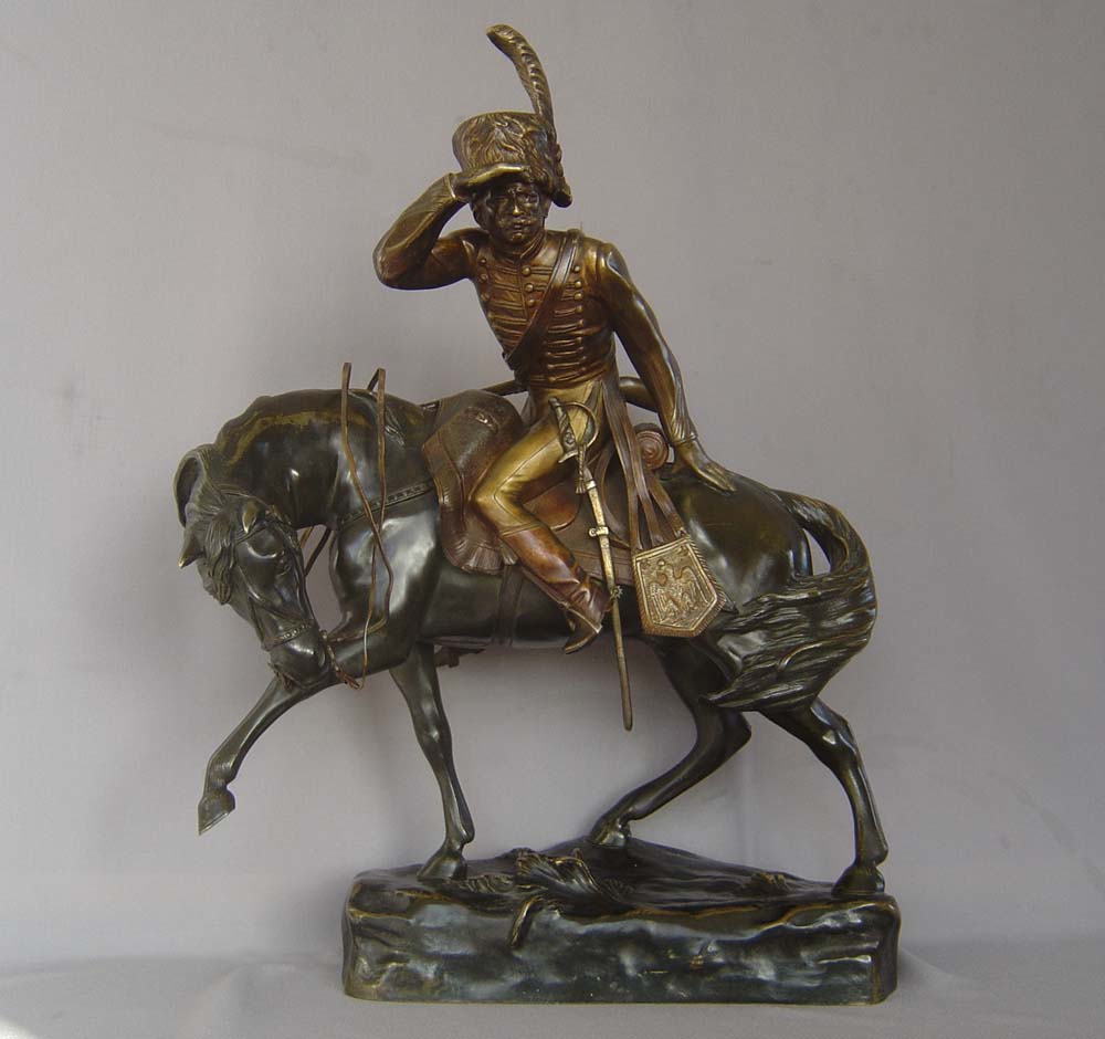 Antique bronze of Napoleonic cavalry officer on his charger signed R. Nannini.