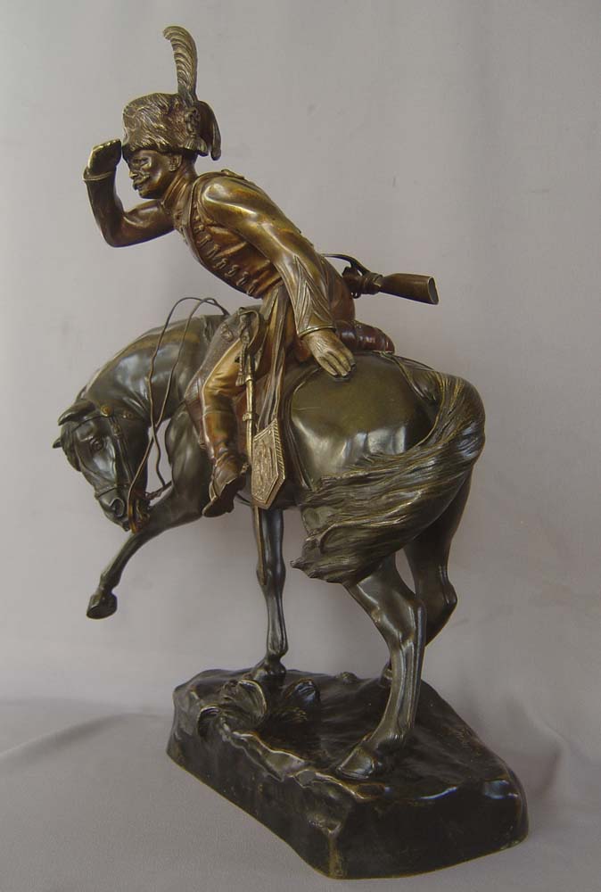 Antique bronze of Napoleonic cavalry officer on his charger signed R. Nannini.