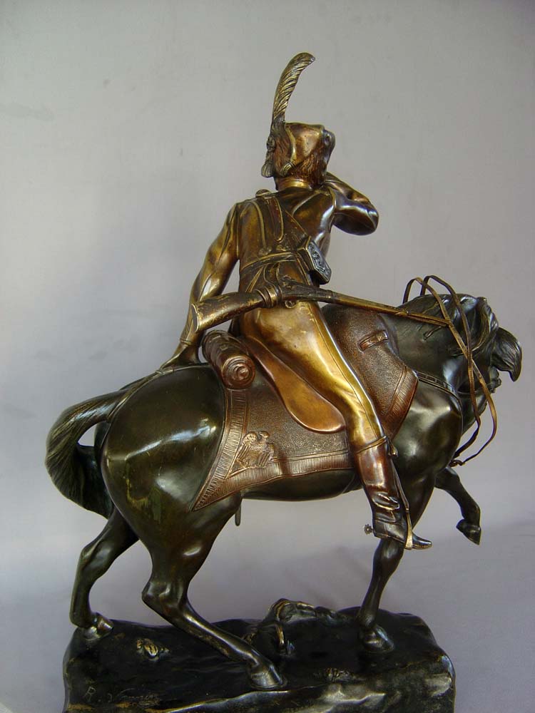 Antique bronze of Napoleonic cavalry officer on his charger signed R. Nannini.