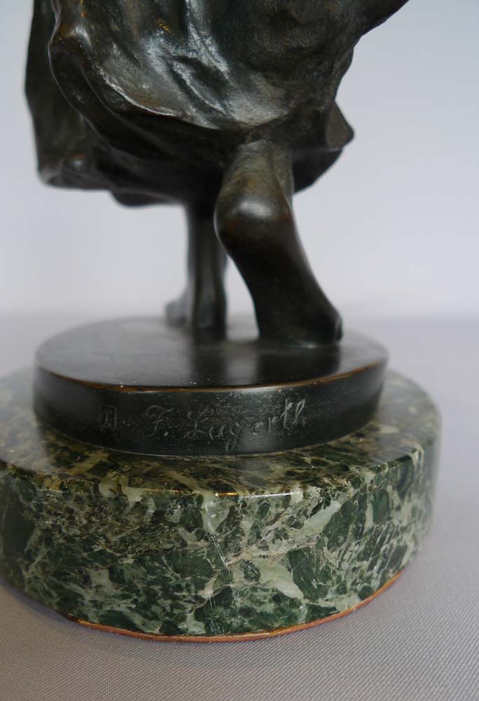 Antique Bronze figure of a maiden throwing a discus signed Ferdinand Lugerth