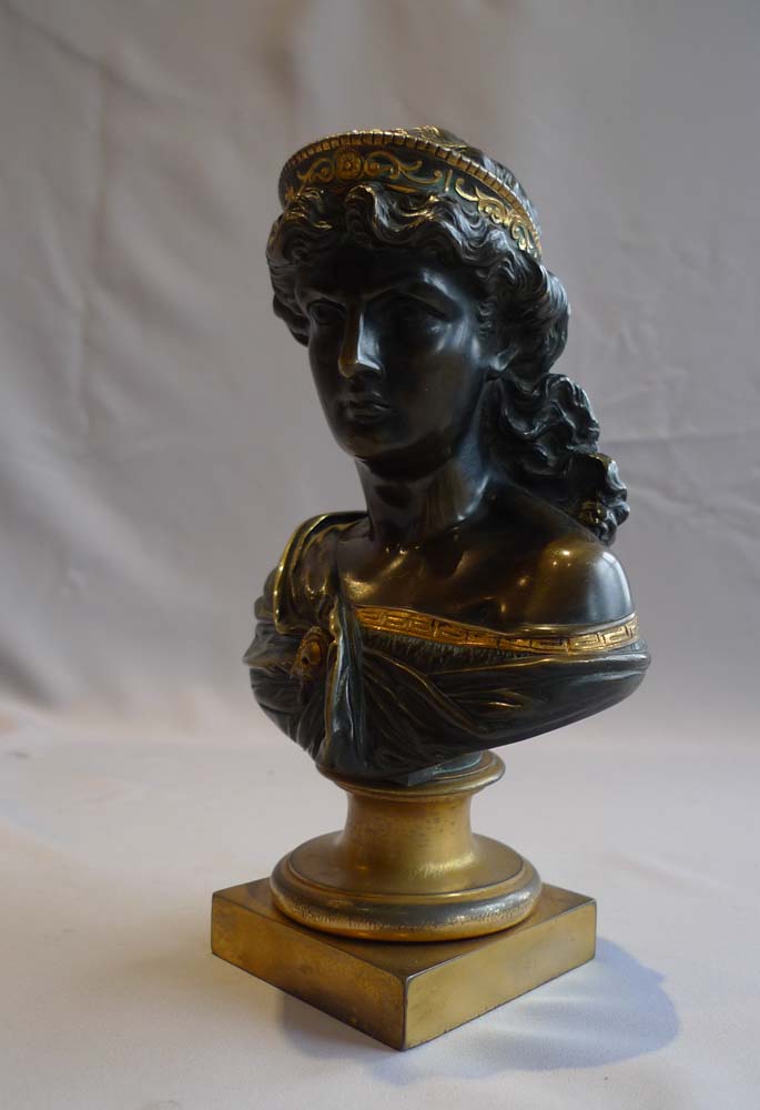 Antique bust of a classical woman in patinated bronze and ormolu.