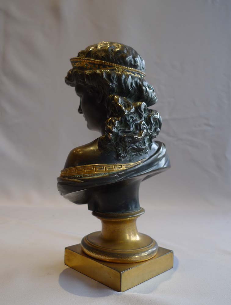 Antique bust of a classical woman in patinated bronze and ormolu.