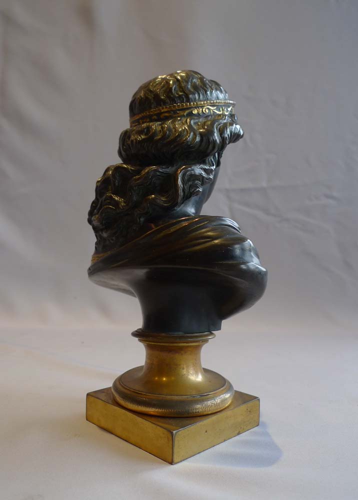 Antique bust of a classical woman in patinated bronze and ormolu.