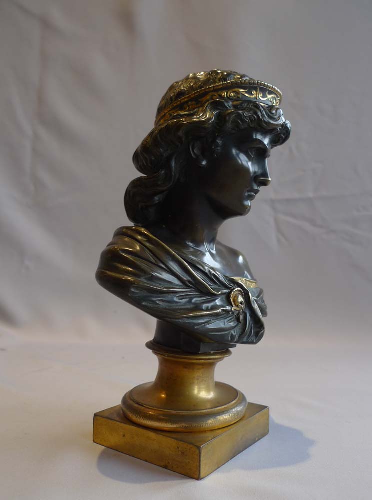Antique bust of a classical woman in patinated bronze and ormolu.