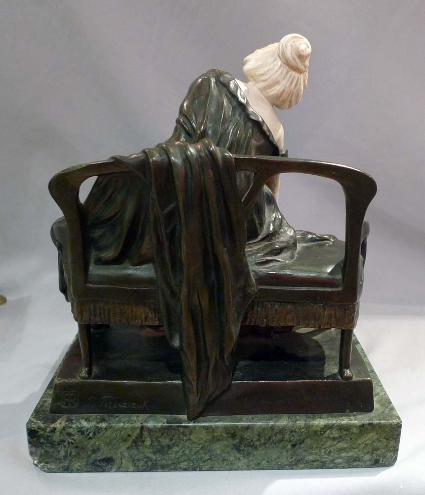 Art Nouveau bronze and ivory sculpture of girl on a bench by P Tereszczuk.