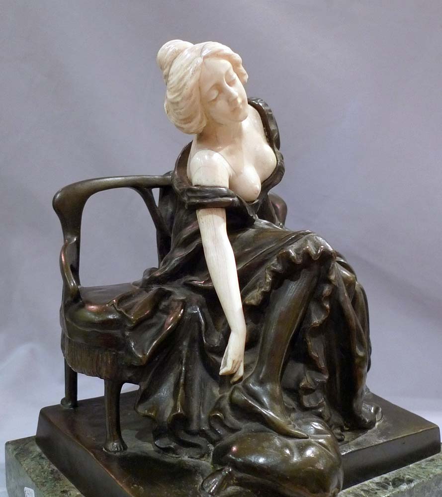 Art Nouveau bronze and ivory sculpture of girl on a bench by P Tereszczuk.