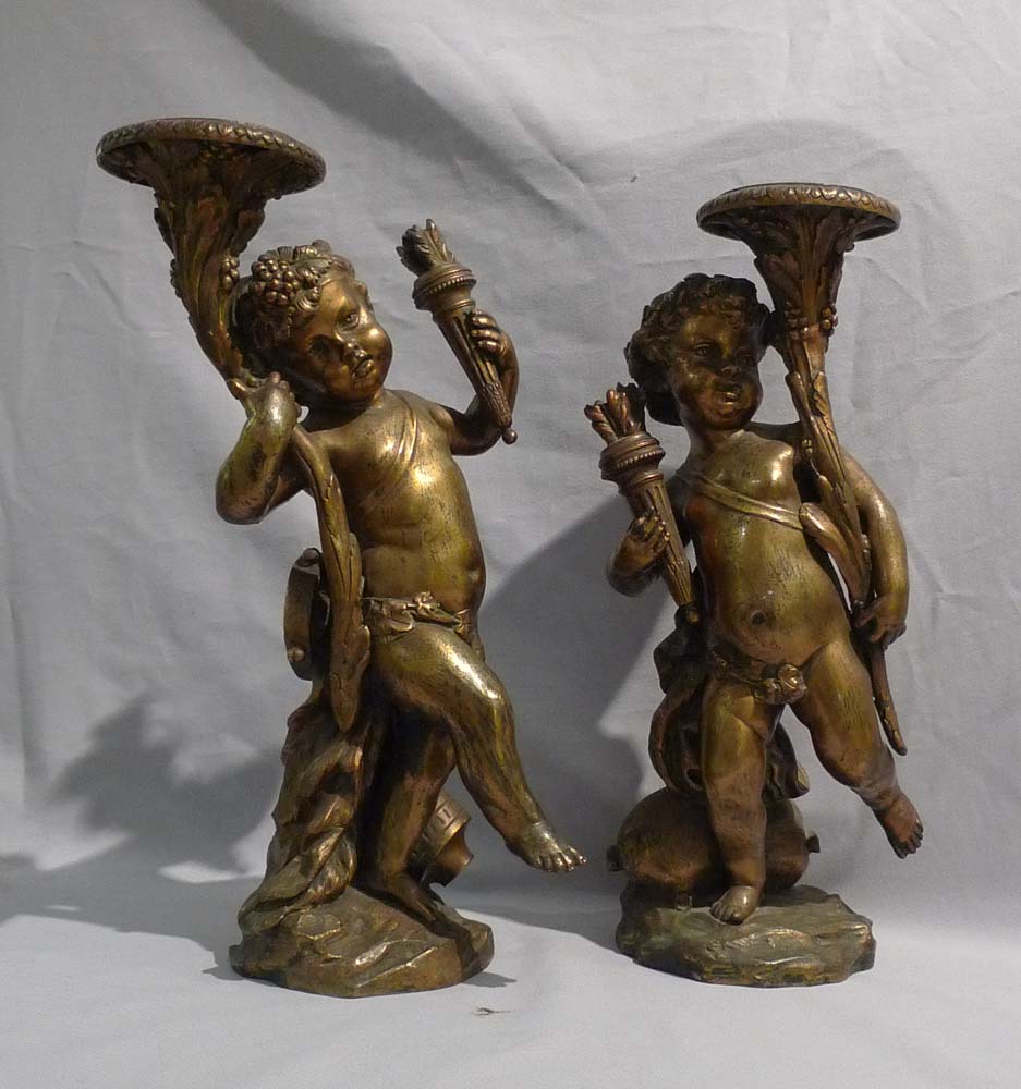 Antique bronze cherubs or bacchantes after a model by Clodion.
