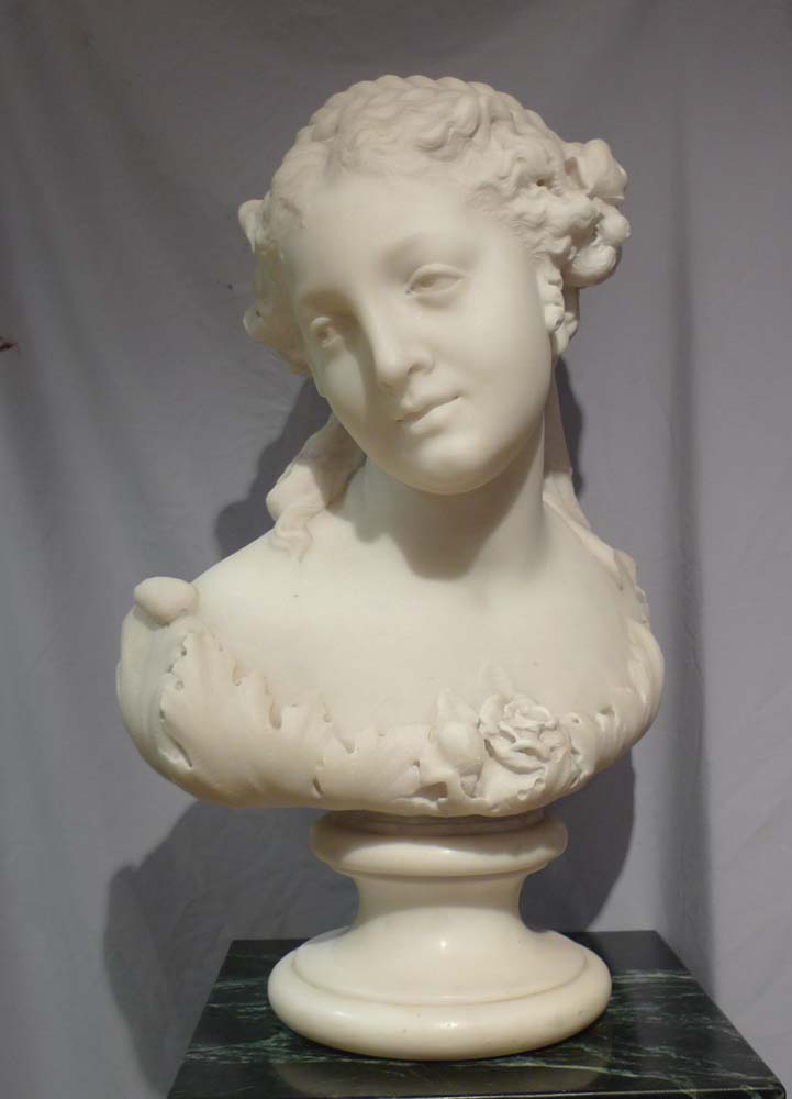 Antique Italian carrera marble bust of Flora on circular socle.