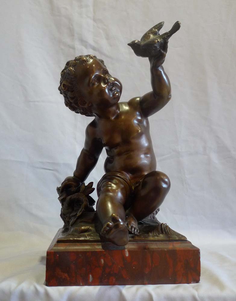 Antique French bronze of putti signed A Moreau, on rouge marble base