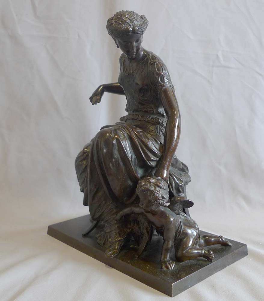 Antique French patinated bronze group of woman and cupid by Jean Jules Salmson.