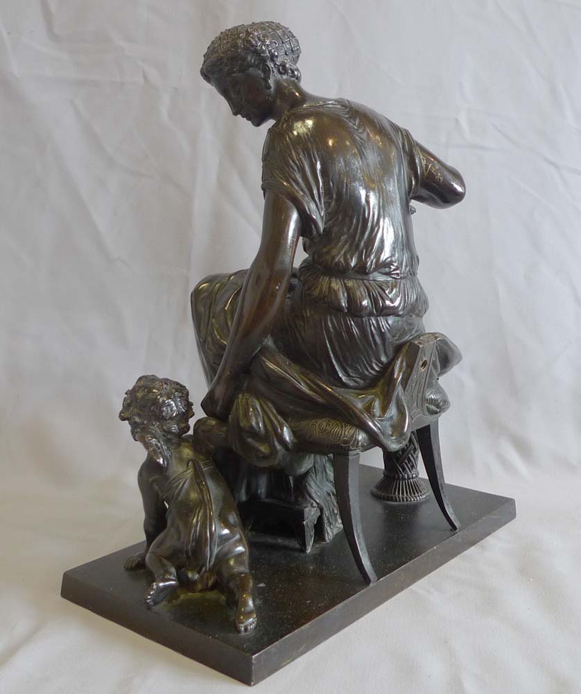 Antique French patinated bronze group of woman and cupid by Jean Jules Salmson.
