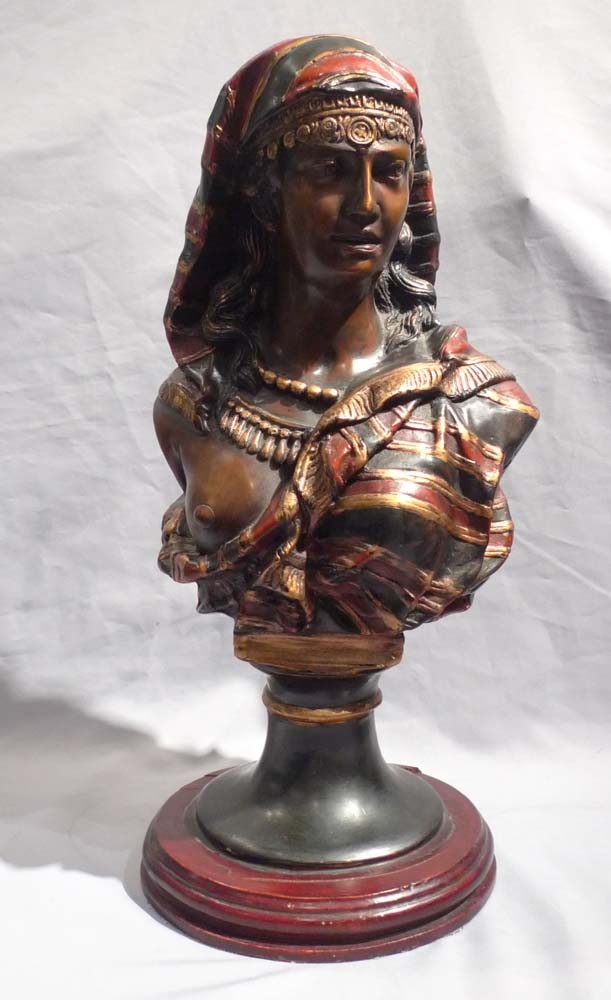 Pair of orientalist cold painted busts of a man and woman.