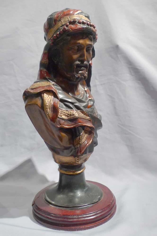 Pair of orientalist cold painted busts of a man and woman.