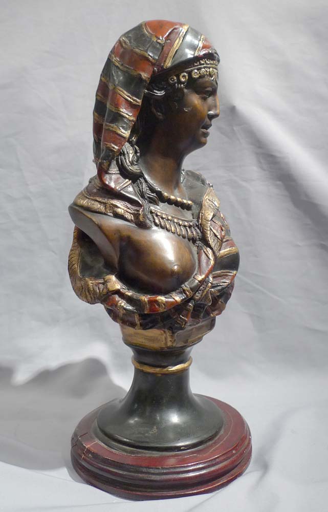 Pair of orientalist cold painted busts of a man and woman.