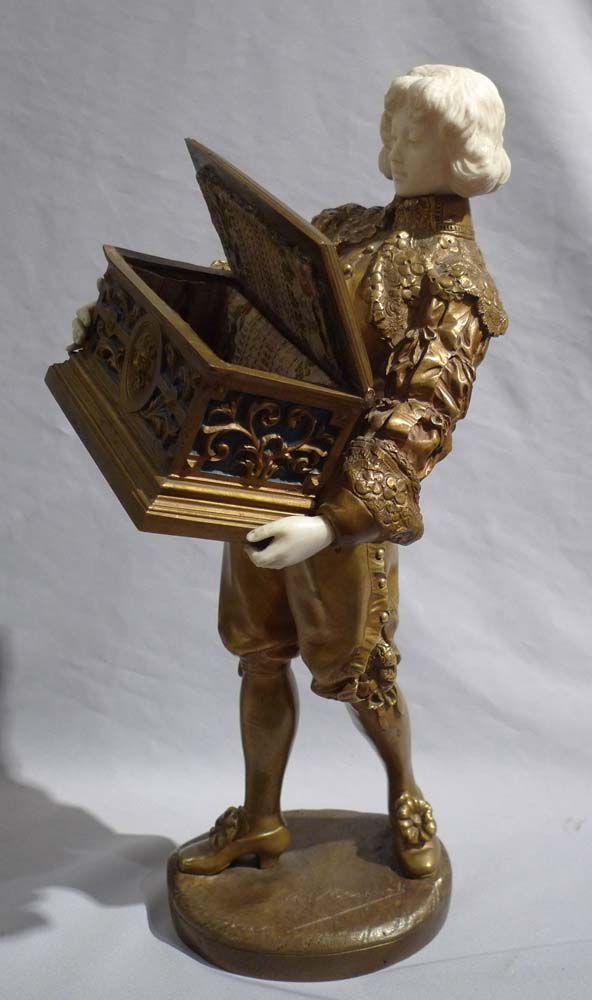 Ormolu and ivory figure of page holding casket with watercolour on ivory signed Rene Marquet.