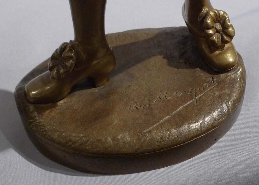 Ormolu and ivory figure of page holding casket with watercolour on ivory signed Rene Marquet.