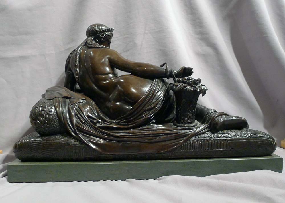 Fine antique bronze of Cleopatra with Asp on a green marble base