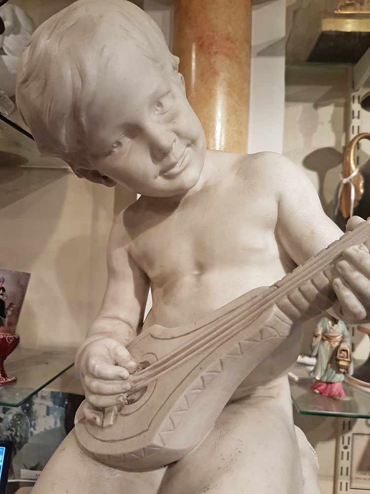 Antique White Carrera Marble Sculpture of Boy playing a Flute Signed E. Barrias