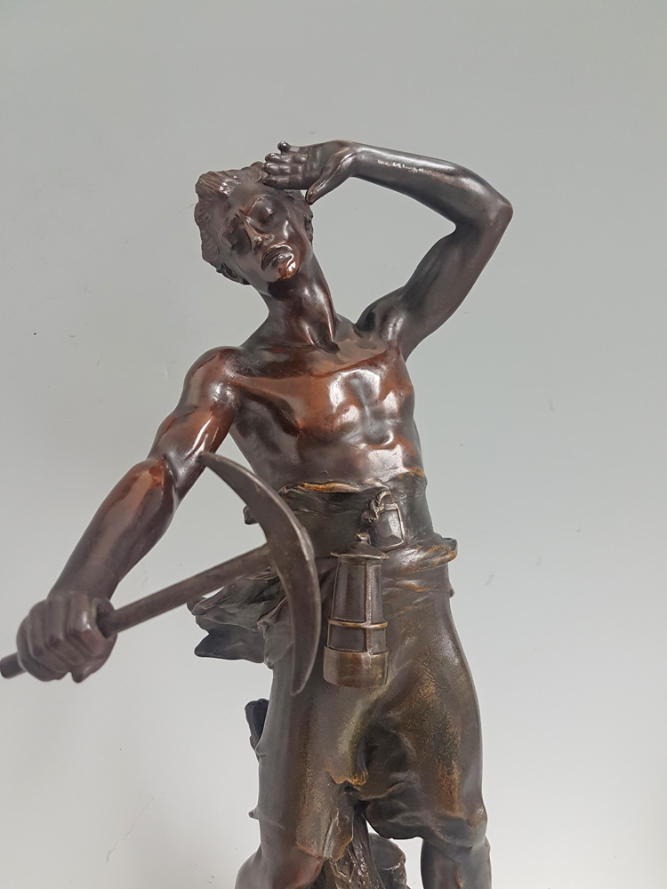 Antique Bronze Sculpture depicting a  miner signed by Jean-Baptiste Germain