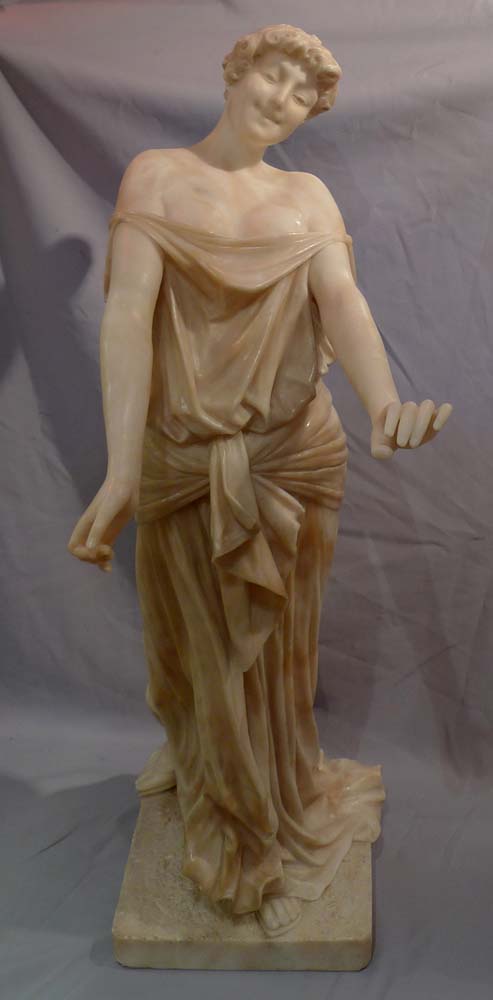 Art Nouveau alabaster figure of a maiden with her dress slipping.