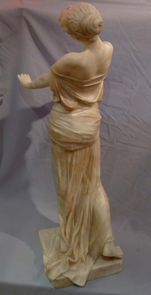 Art Nouveau alabaster figure of a maiden with her dress slipping.