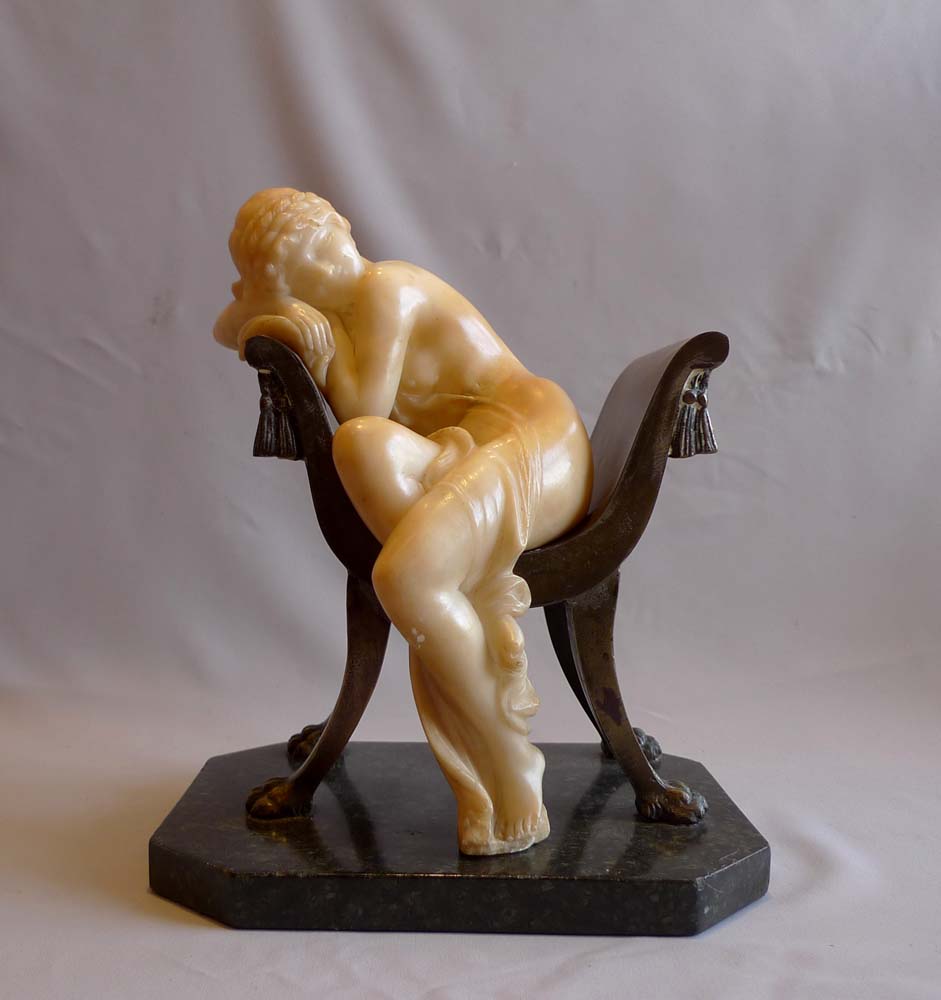 Art Nouveau alabaster and bronze sculpture of girl on a chair.
