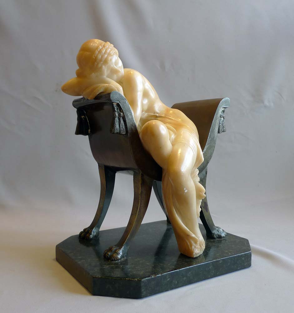 Art Nouveau alabaster and bronze sculpture of girl on a chair.