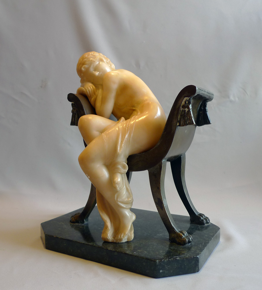 Art Nouveau alabaster and bronze sculpture of girl on a chair.