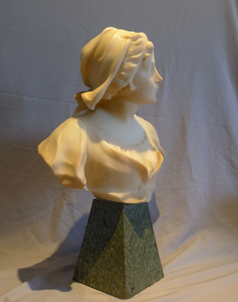 Attractive French early 20th century alabaster and marble bust of a young woman.