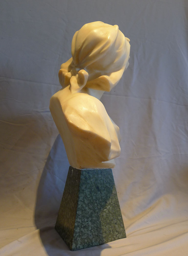 Attractive French early 20th century alabaster and marble bust of a young woman.