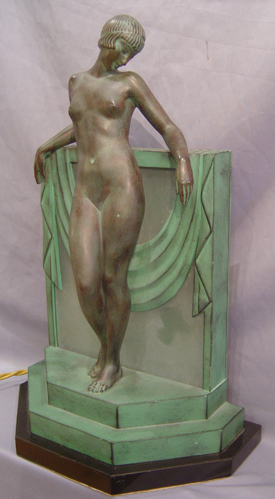 Art deco bronze lamp signed Fayral.