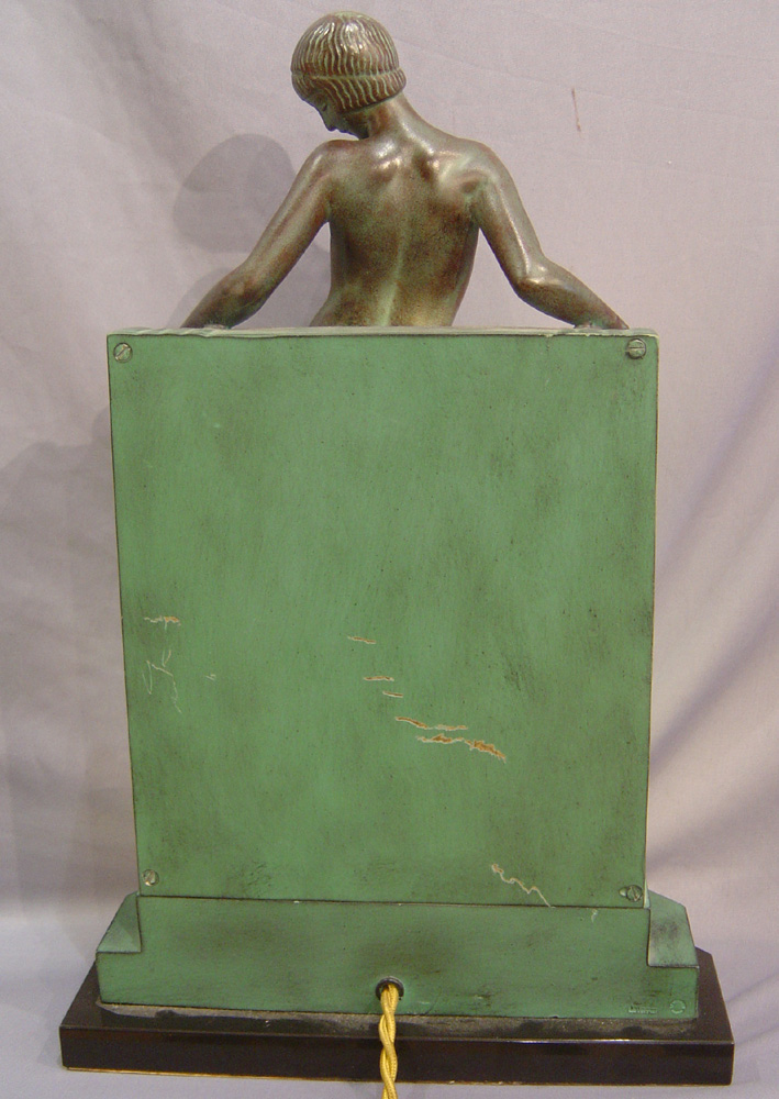 Art deco bronze lamp signed Fayral.