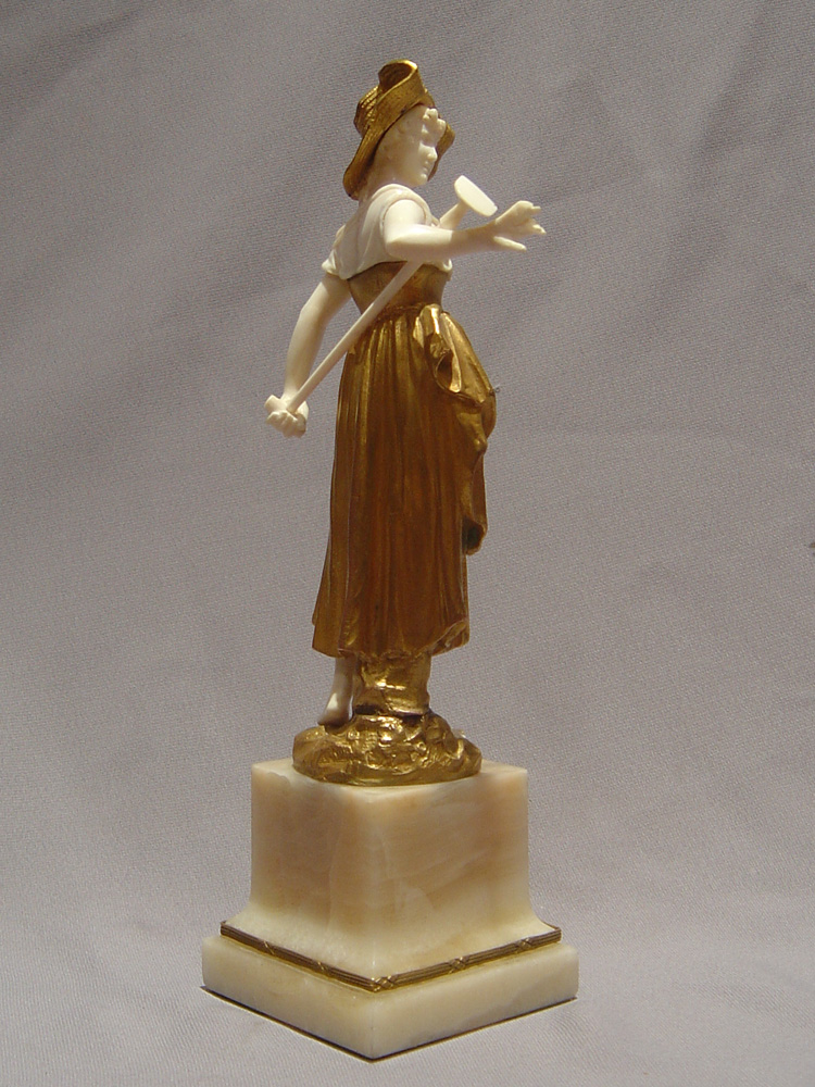 Art Deco bronze and ivory figure of a gardener.